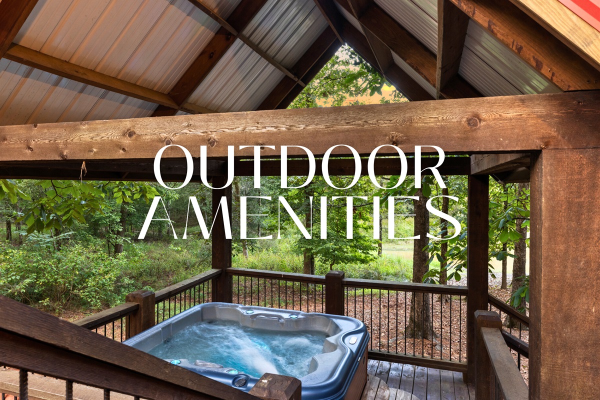 Outdoor living at its best: hot tub, covered deck, and fresh forest air.