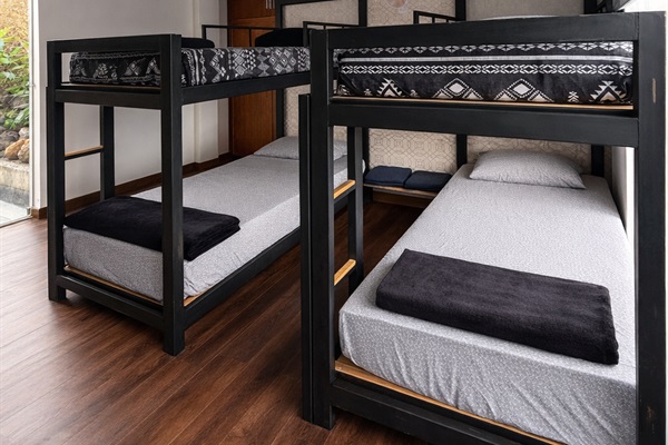 Room #3 - these are 4 very comfortable single beds (can fit a couple on one), and we can also join them together to make 2 larger beds.