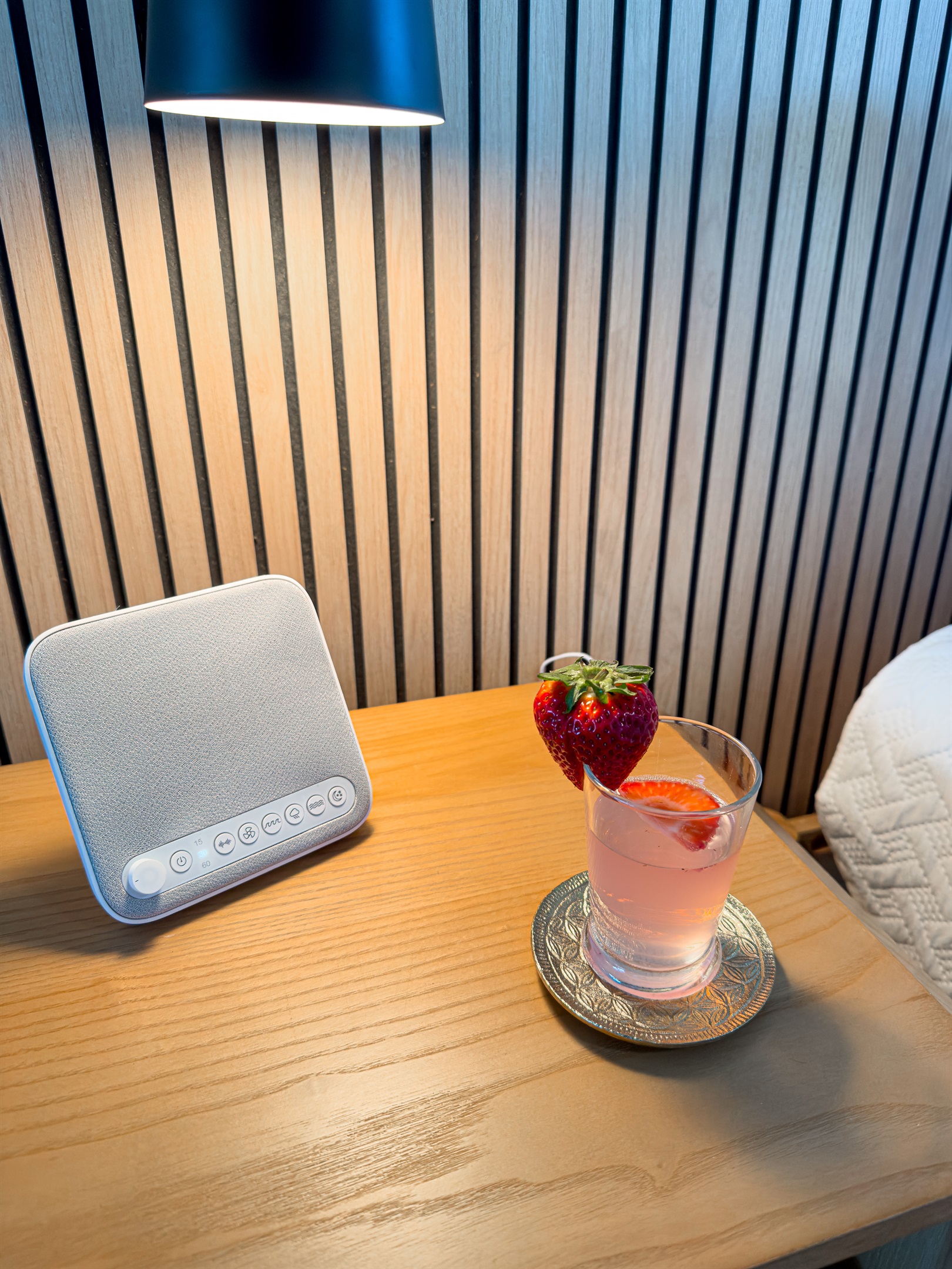 Read a good book in bed using the warm wall sconces. The quiet ceiling fan keeps the room cool on warm nights.
Sound machines are offered in each bedroom.