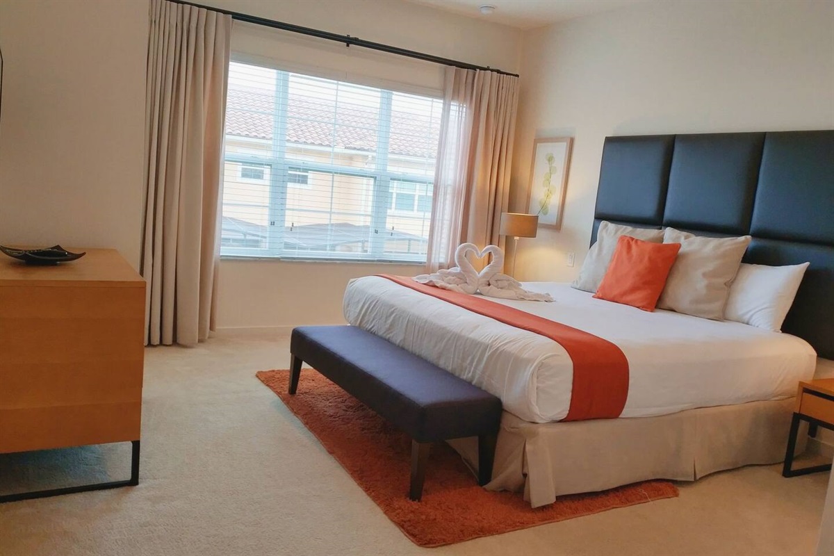The master bedroom has a king bed...