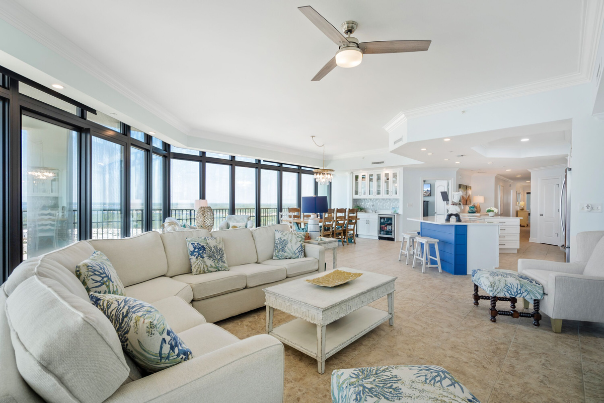 Spacious family room open to dining, kitchen & wet bar w/ incredible beach view