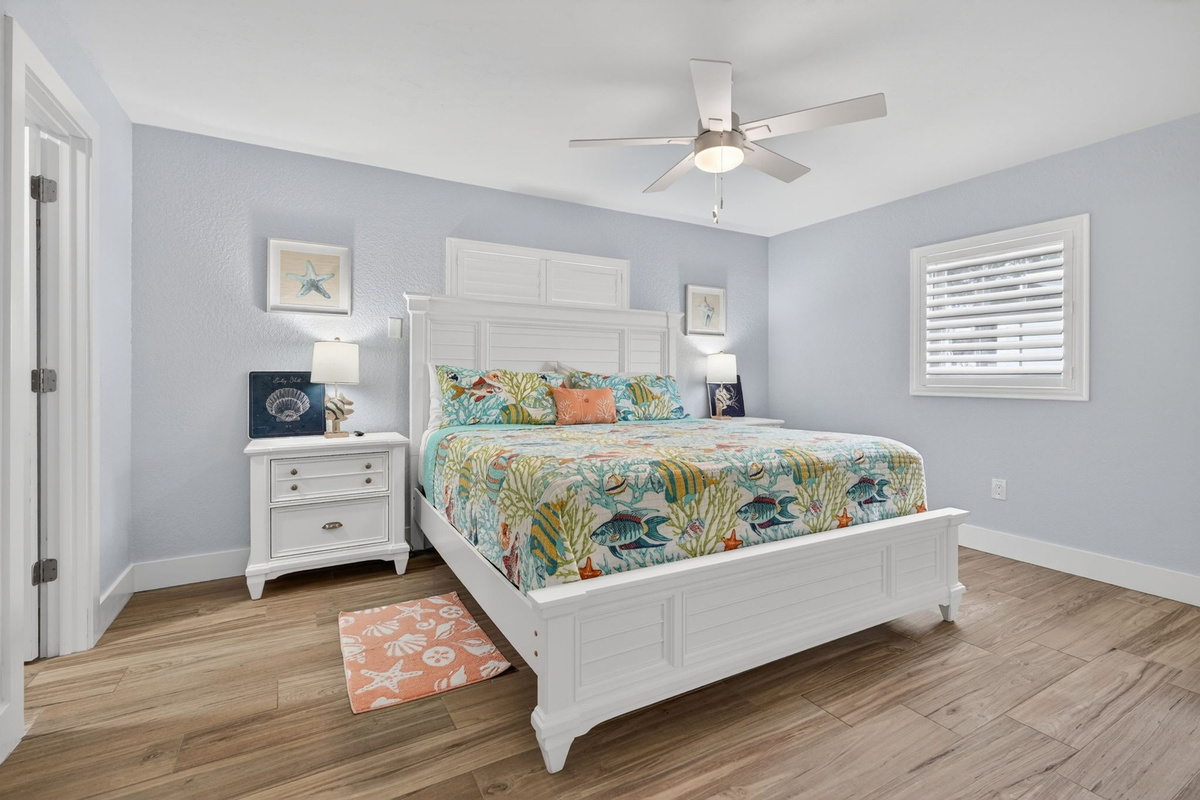 Bedroom with blue and white bedspread