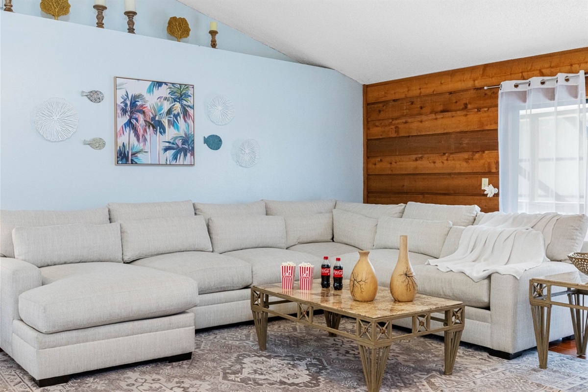 Accented with throw pillows and extra-deep seating, it's perfect for mid-day naps, family lounging, or curling up with a book and a breeze.