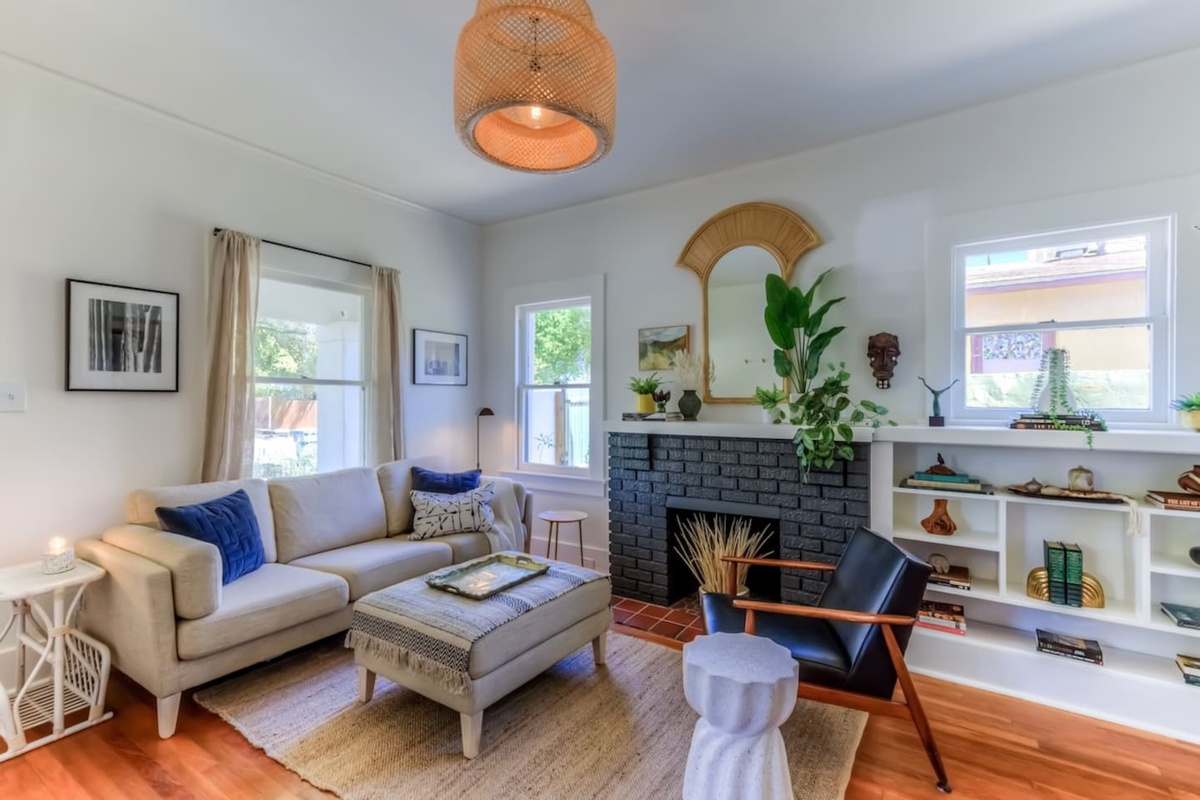 living room with updated decor and wood floors