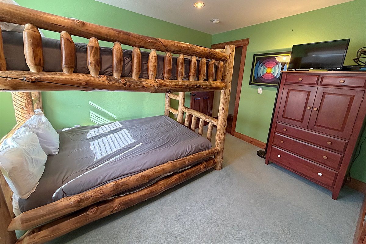 Bedroom #2 with Queen-over-Queen bunk beds and attached full bathroom on upper level.