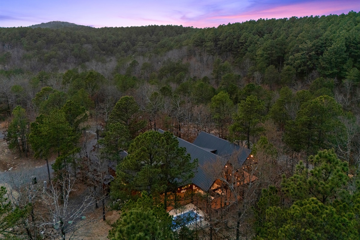 Surrounded by rolling hills and tall trees, the cabin offers beautiful views that make it easy to feel connected to the quiet beauty of the area.
