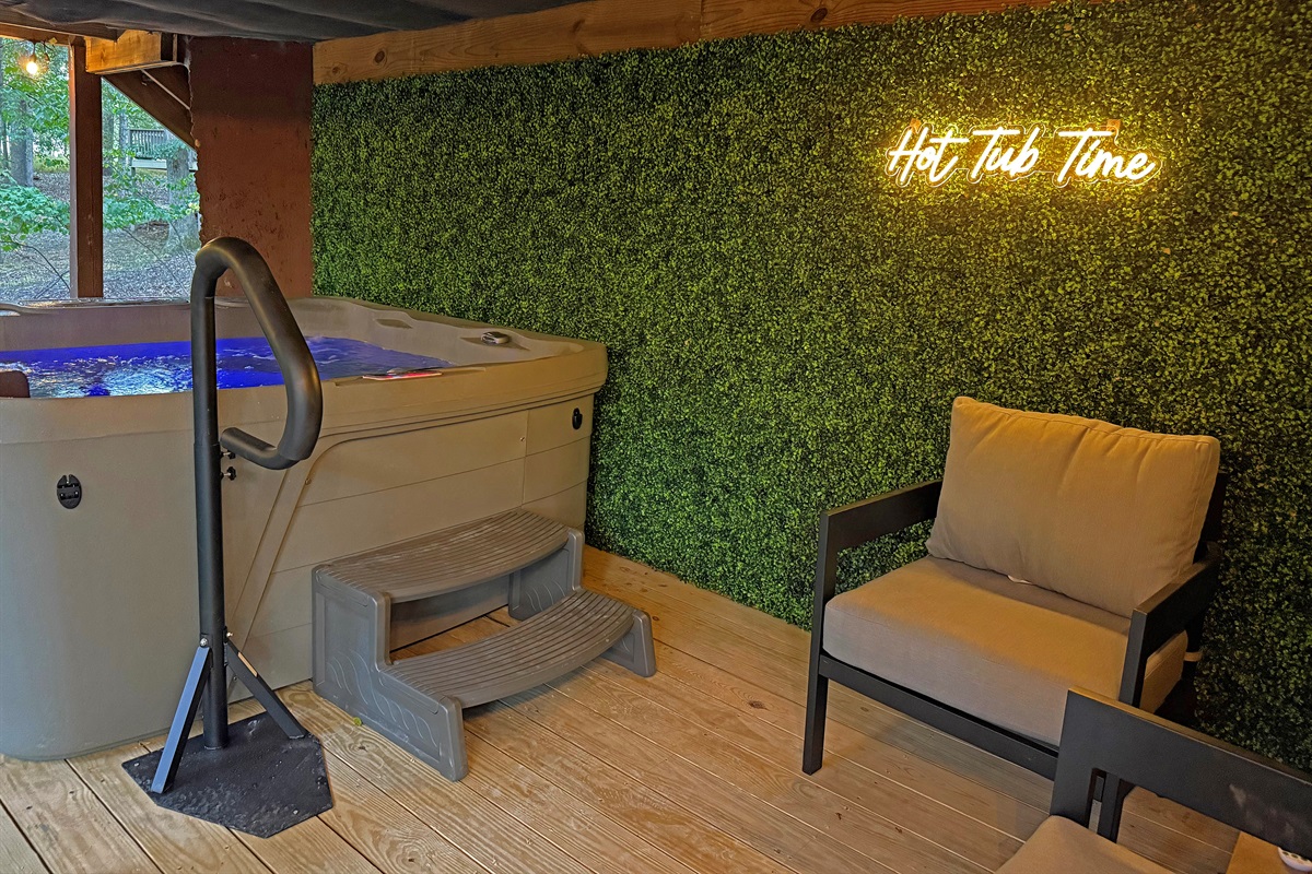 Yes...it is hot tub time.  The hot tub area is covered by a roof so rain won't fall through the deck and spoil your relaxation. 