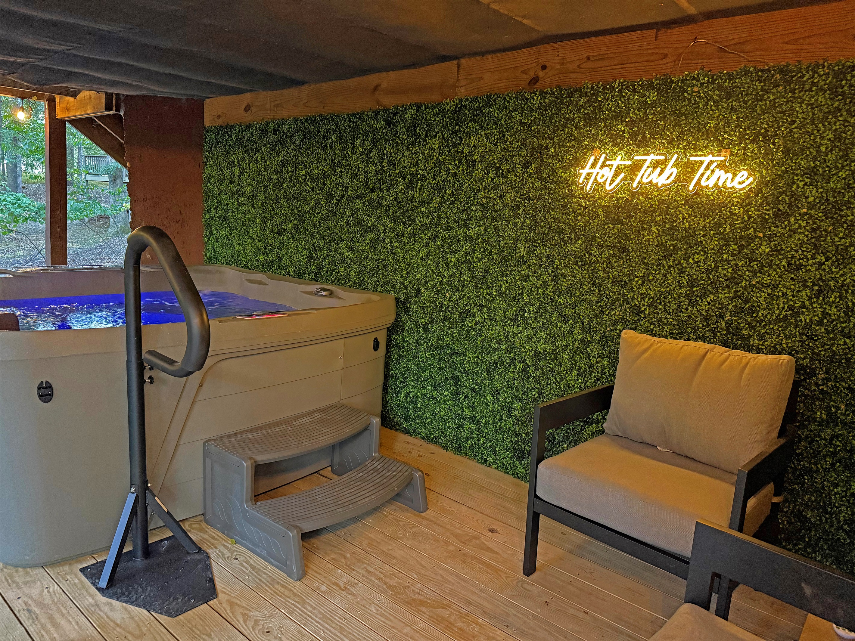Yes...it is hot tub time.  The hot tub area is covered by a roof so rain won't fall through the deck and spoil your relaxation. 
