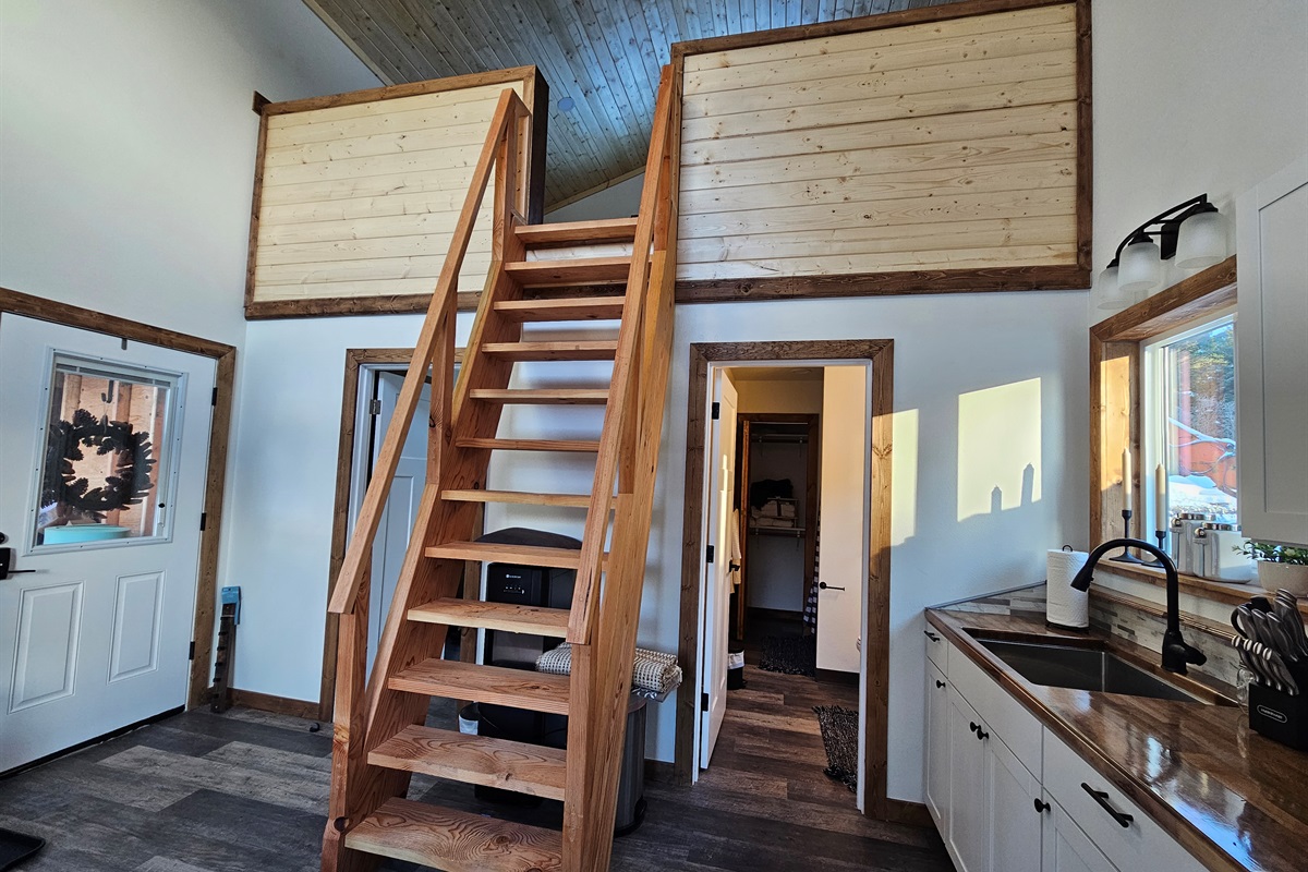 Ships Ladder to access the loft with living space and an extra bed.