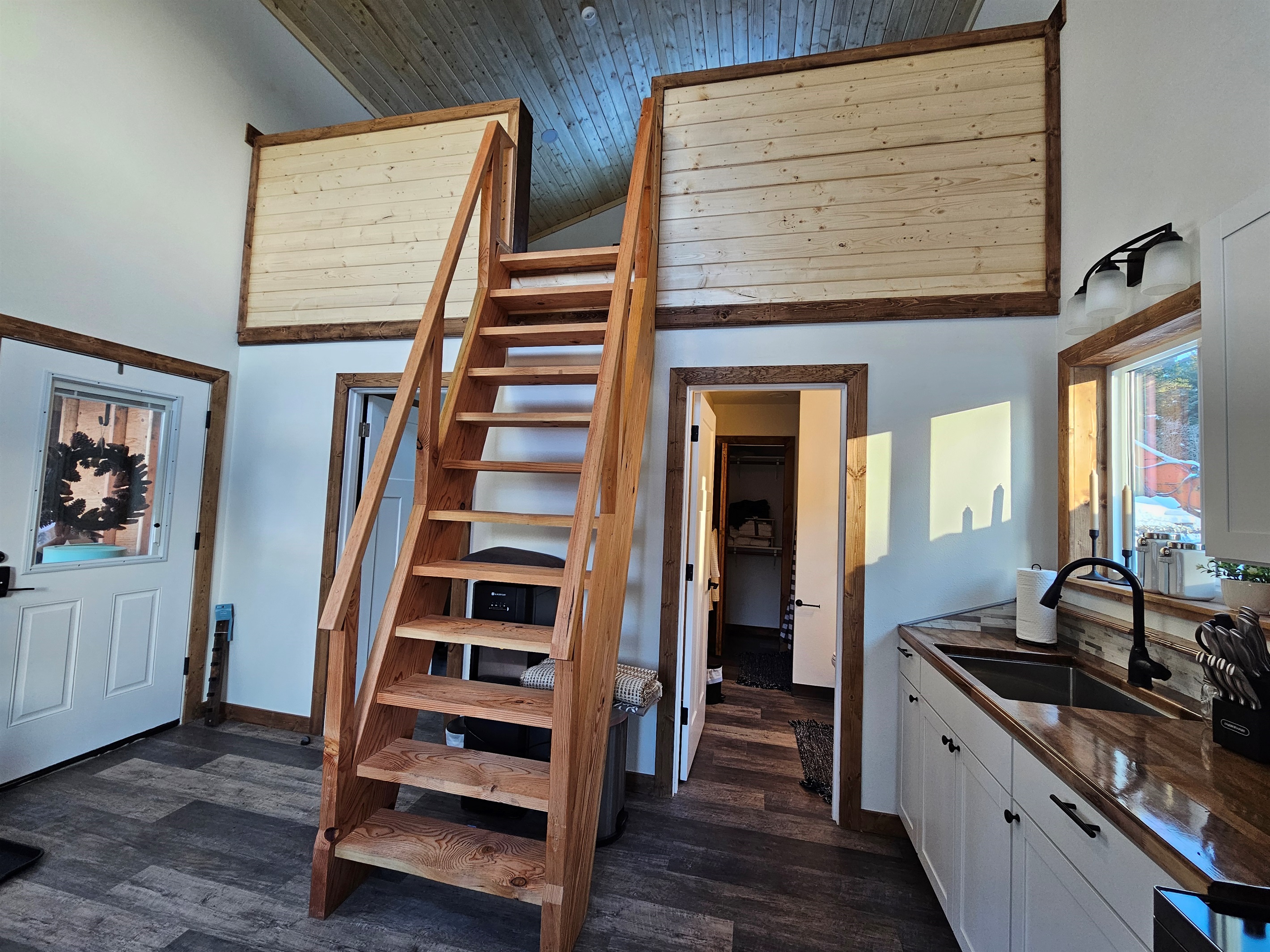 Ships Ladder to access the loft with living space and an extra bed.
