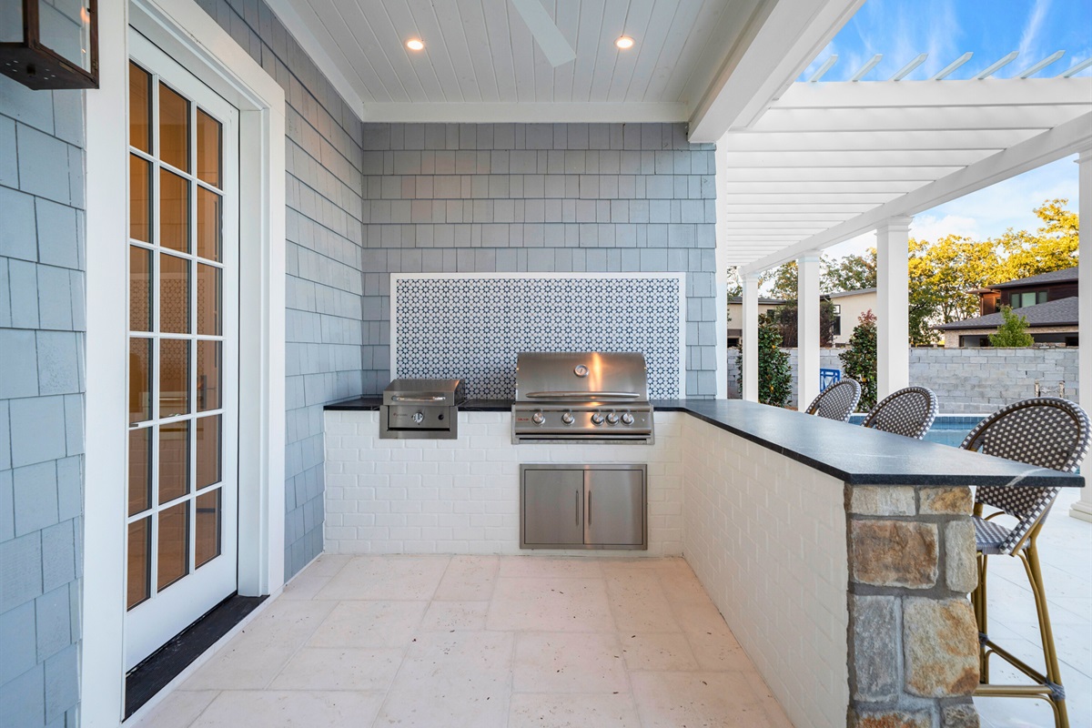 Glass doors opening to the patio and bright living areas.