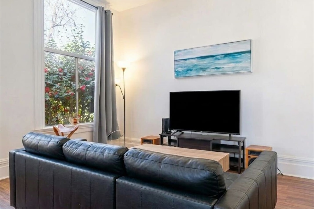 comfortable seating and a flat-screen TV