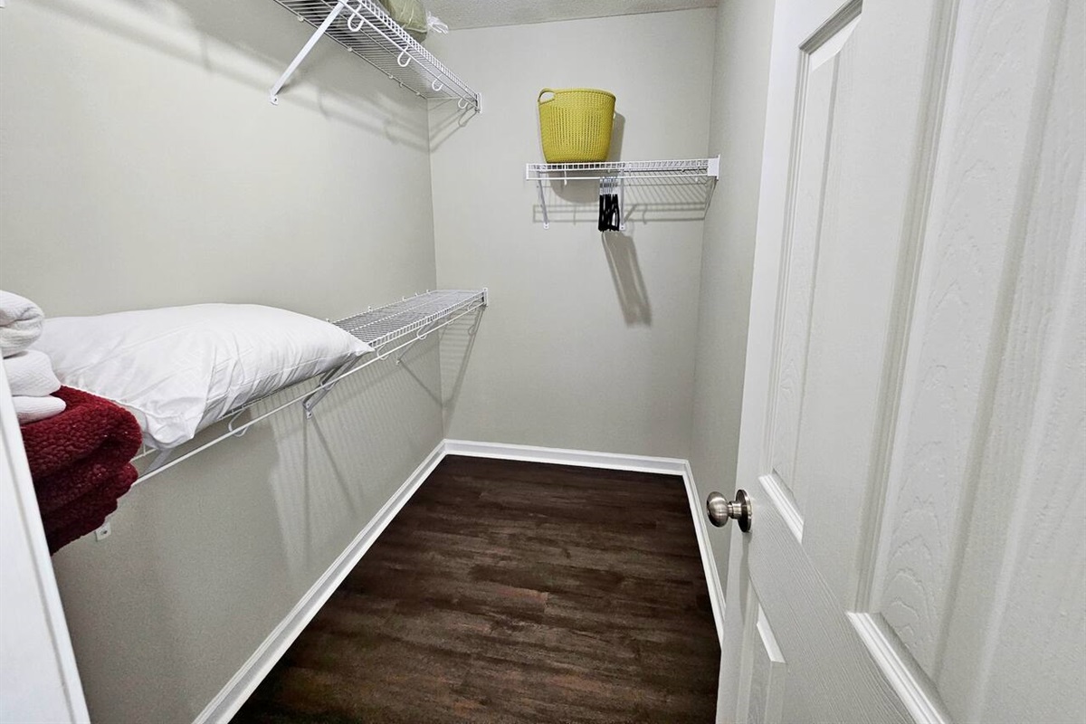 This walk-in closet is located in the main room. There is plenty of space for storage. You will find extra blankets, pillows, and linen here. Velvet hangers included. 