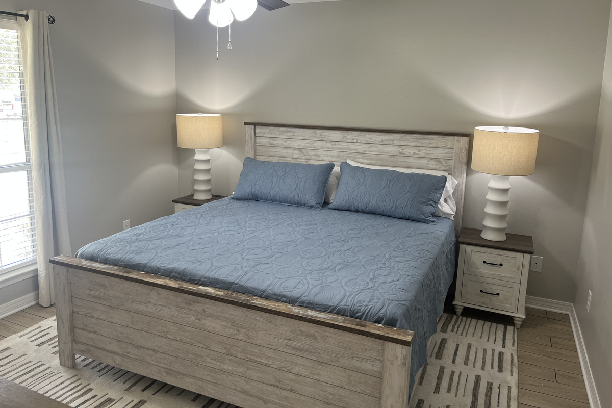 Master Bedroom with ensuite. Comfortable King bed with linens provided.