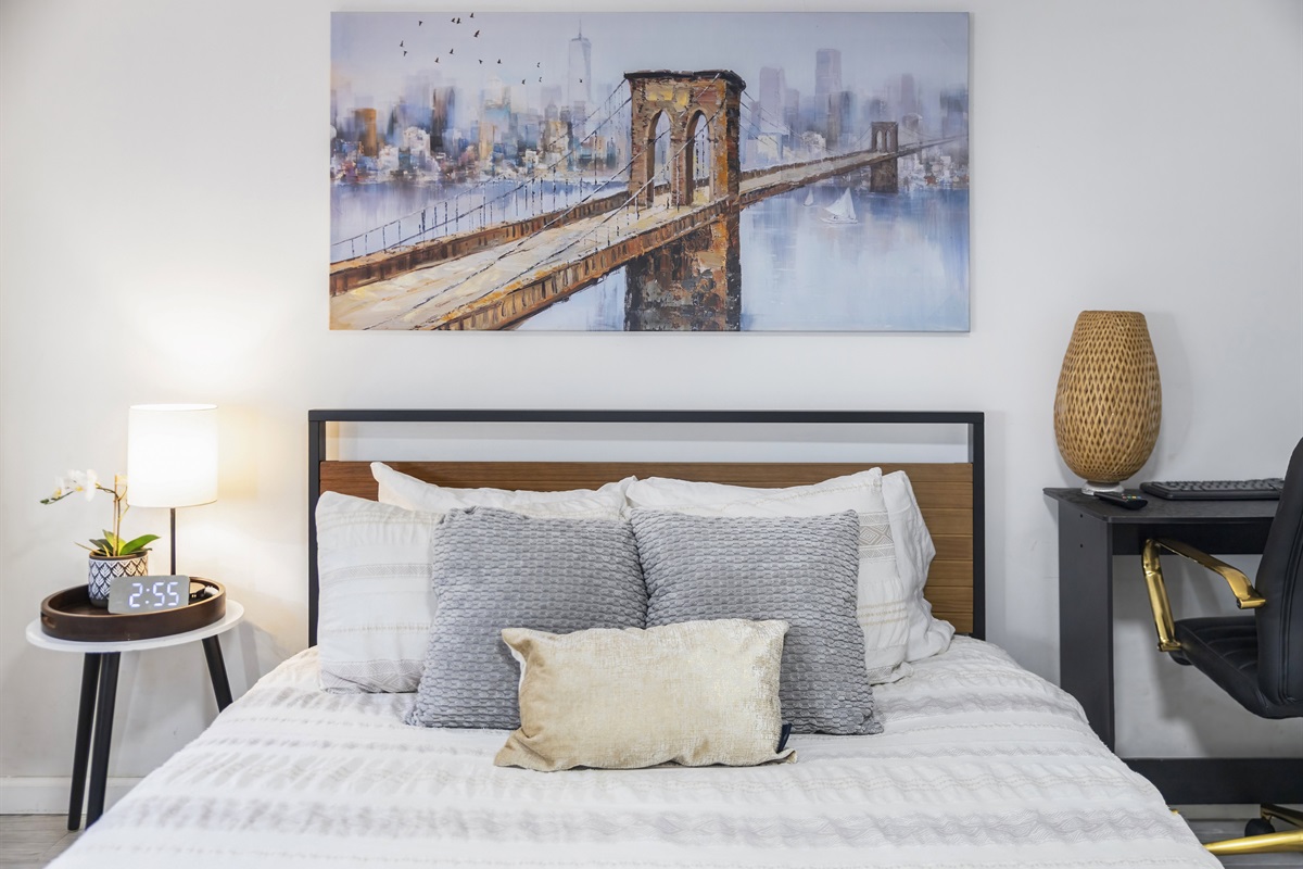 Crawl into plush bedding and drift off quickly in a calm bedroom designed for deep, restorative sleep.