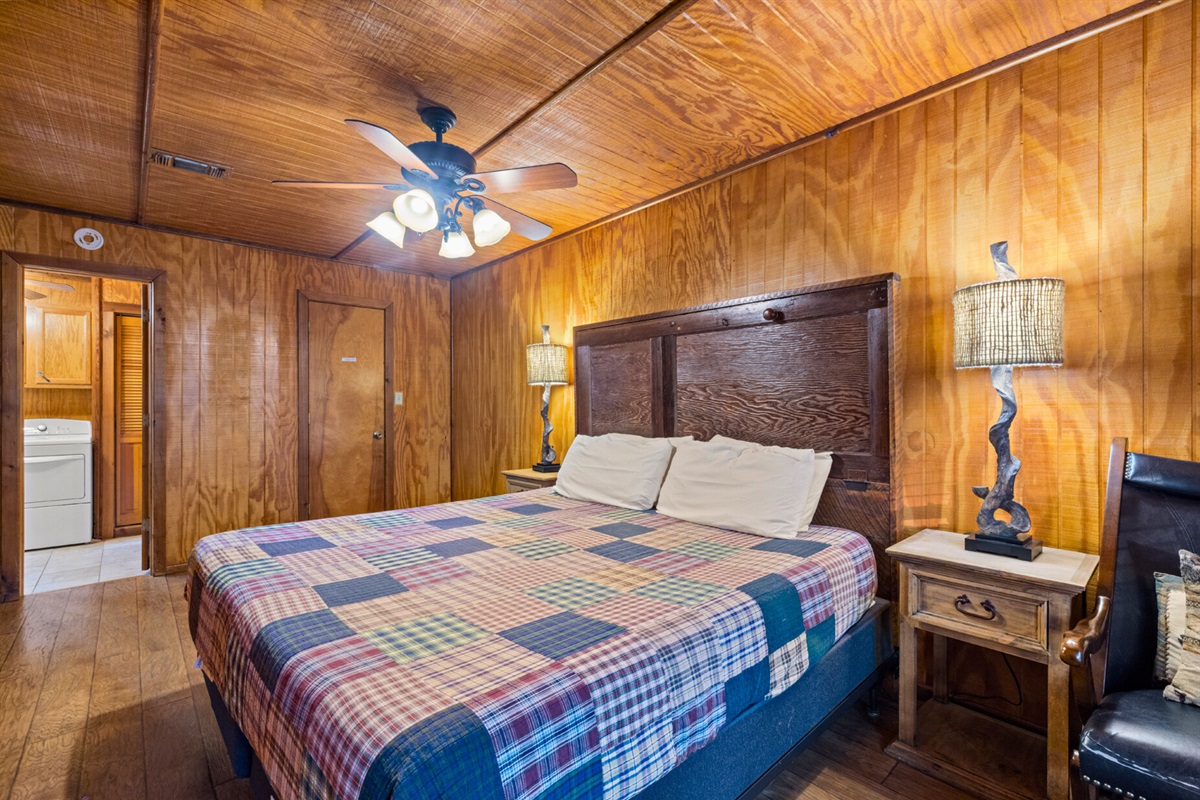 Cozy space with wood paneling and cabin décor.