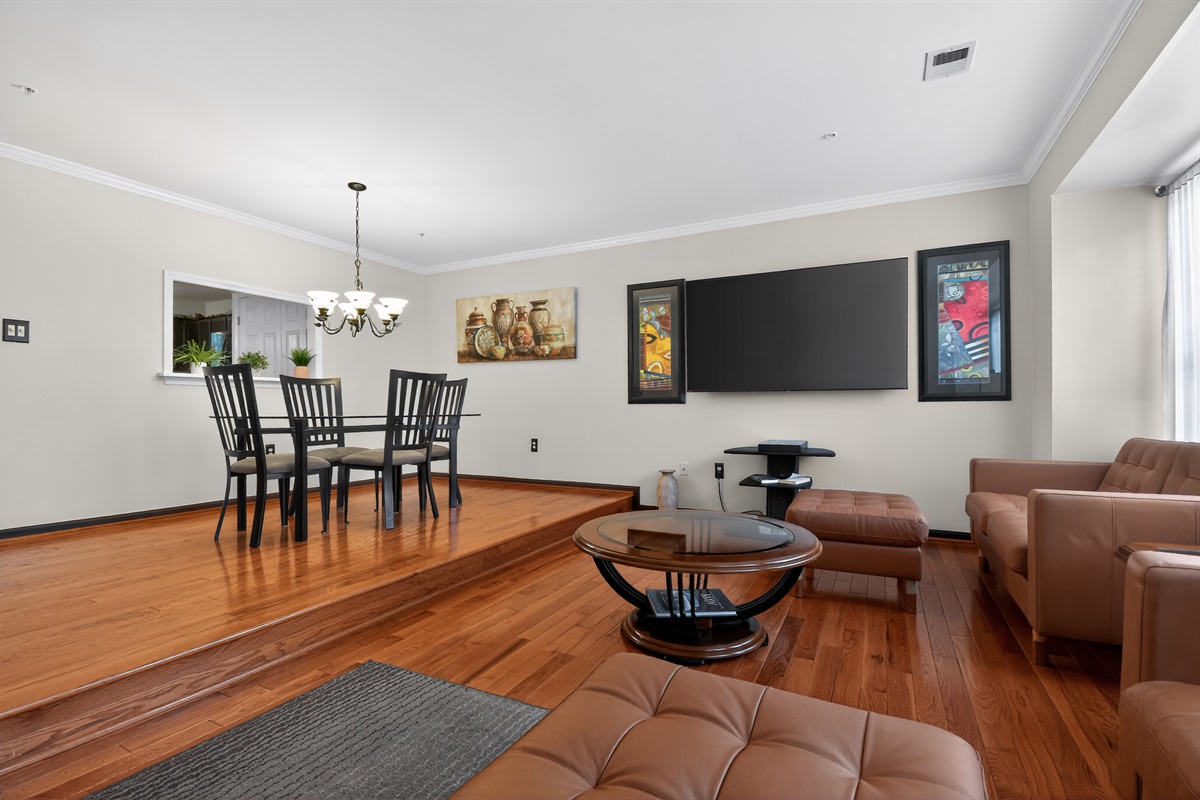 Two Living Rooms — Open Gathering Space, Smart TV, Hardwood Floors Throughout