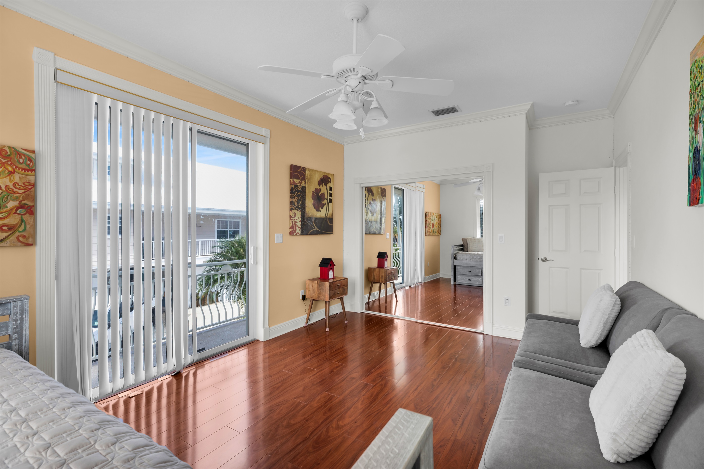 Guest bedroom featuring a twin with trundle and two oversized chair sleepers