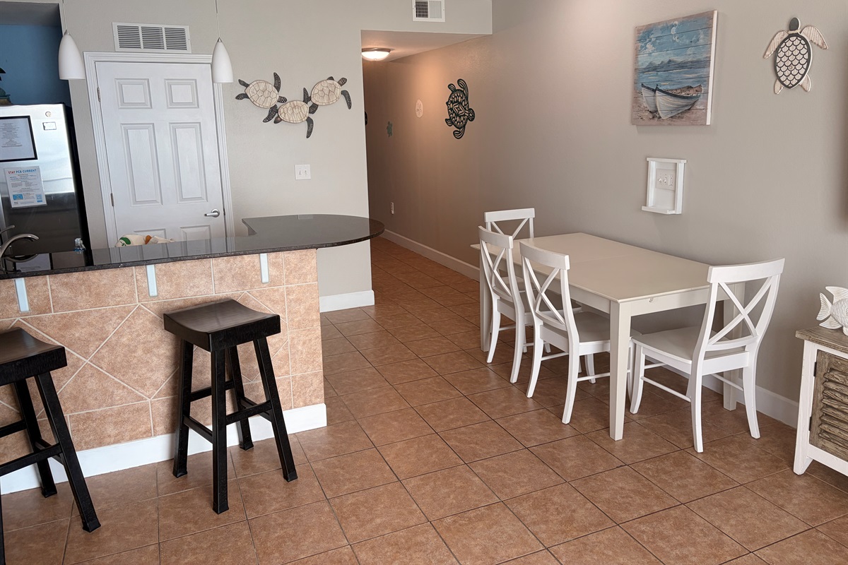 kitchen table Seats 4 guest plus there are Bar stools