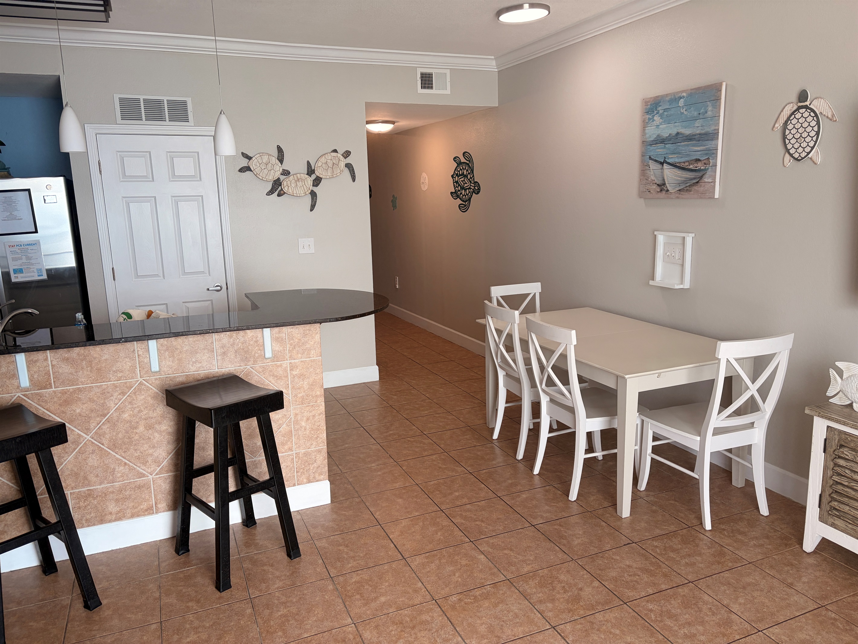 kitchen table Seats 4 guest plus there are Bar stools