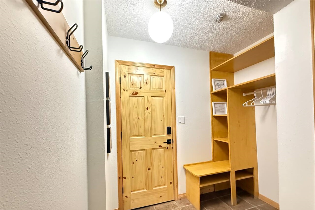 Gear Cubbies: Maximize organization with these built-in cubbies and shelving, providing dedicated storage for footwear, helmets, and gear right by the door.