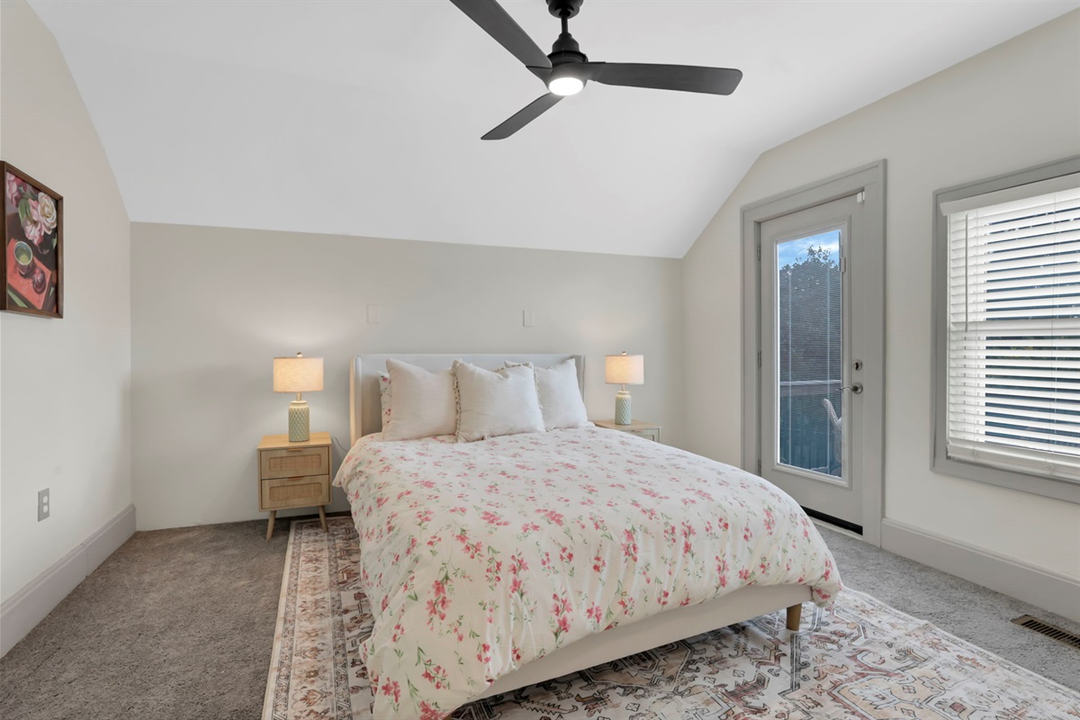 Bedroom 1, queen bed, door to balcony!