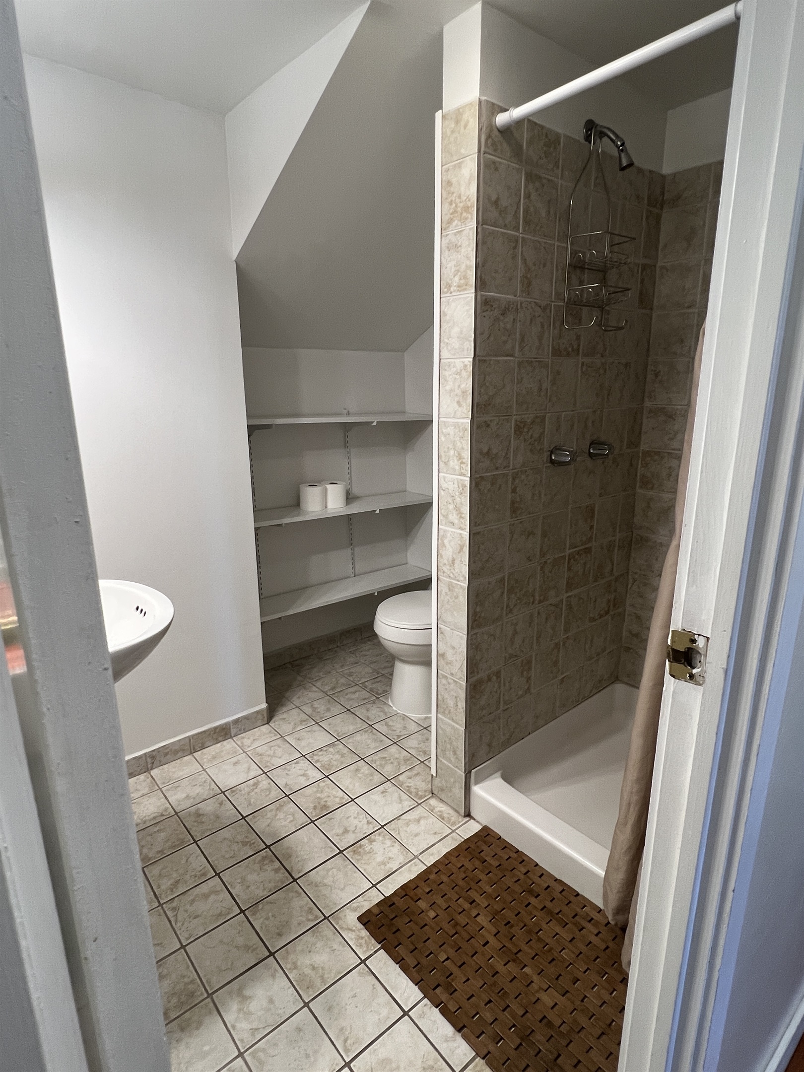 2nd floor family suite shared w/ bedroom #5 and bedroom #6. Bathroom w/ shower.