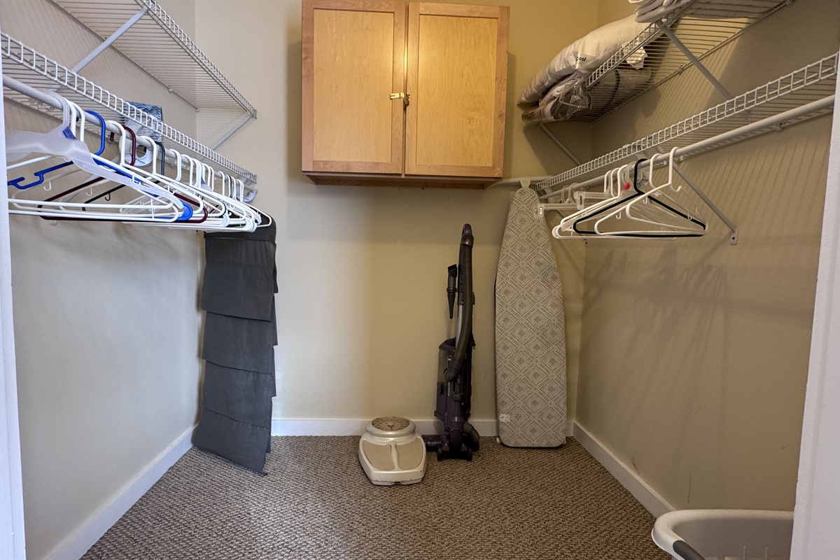 Walk-in closet to the Primary Bedroom