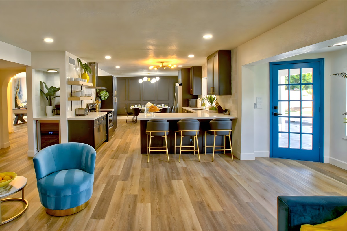 Large chef’s kitchen with peninsula bar for three