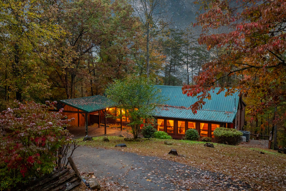 Authentic log cabin filled with warm natural light.