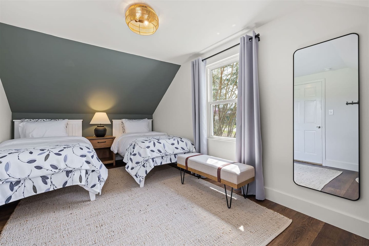 Bedroom #5 includes 2 twin beds + a toddler bed, dresser, full length mirror