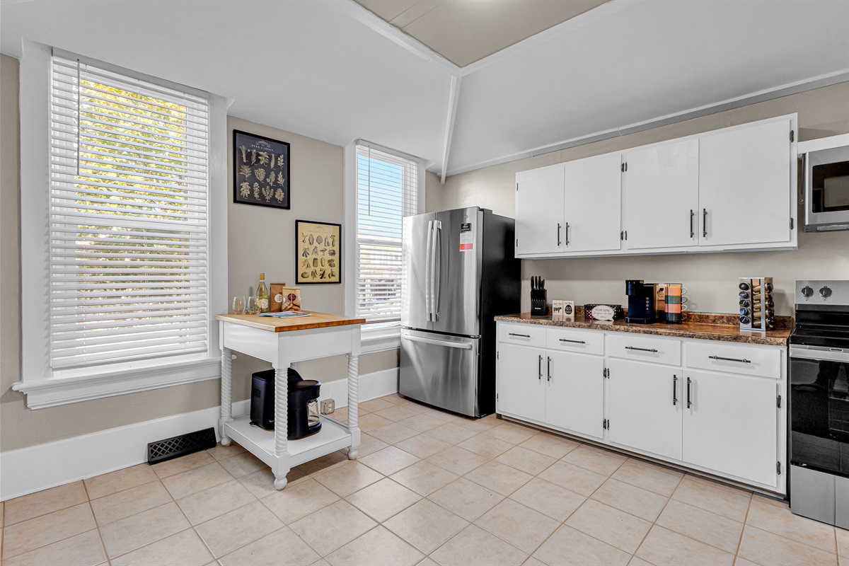 Lower Kitchen with refrigerator, freezer, and ice maker