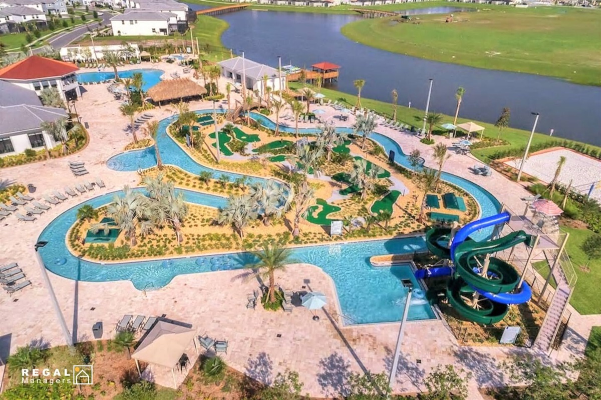 One of the best features of our lovely vacation home is the FREE WATER PARK, with water slides, lazy river, mini golf, and more!
