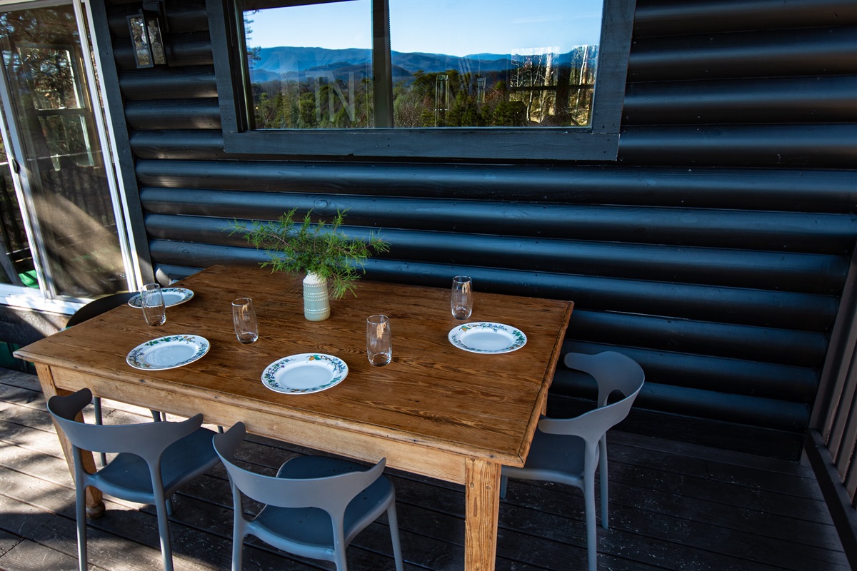 Pull up a chair and take in the views from our antique dining table on the lower deck. The perfect spot for a dreamy outdoor dining experience!