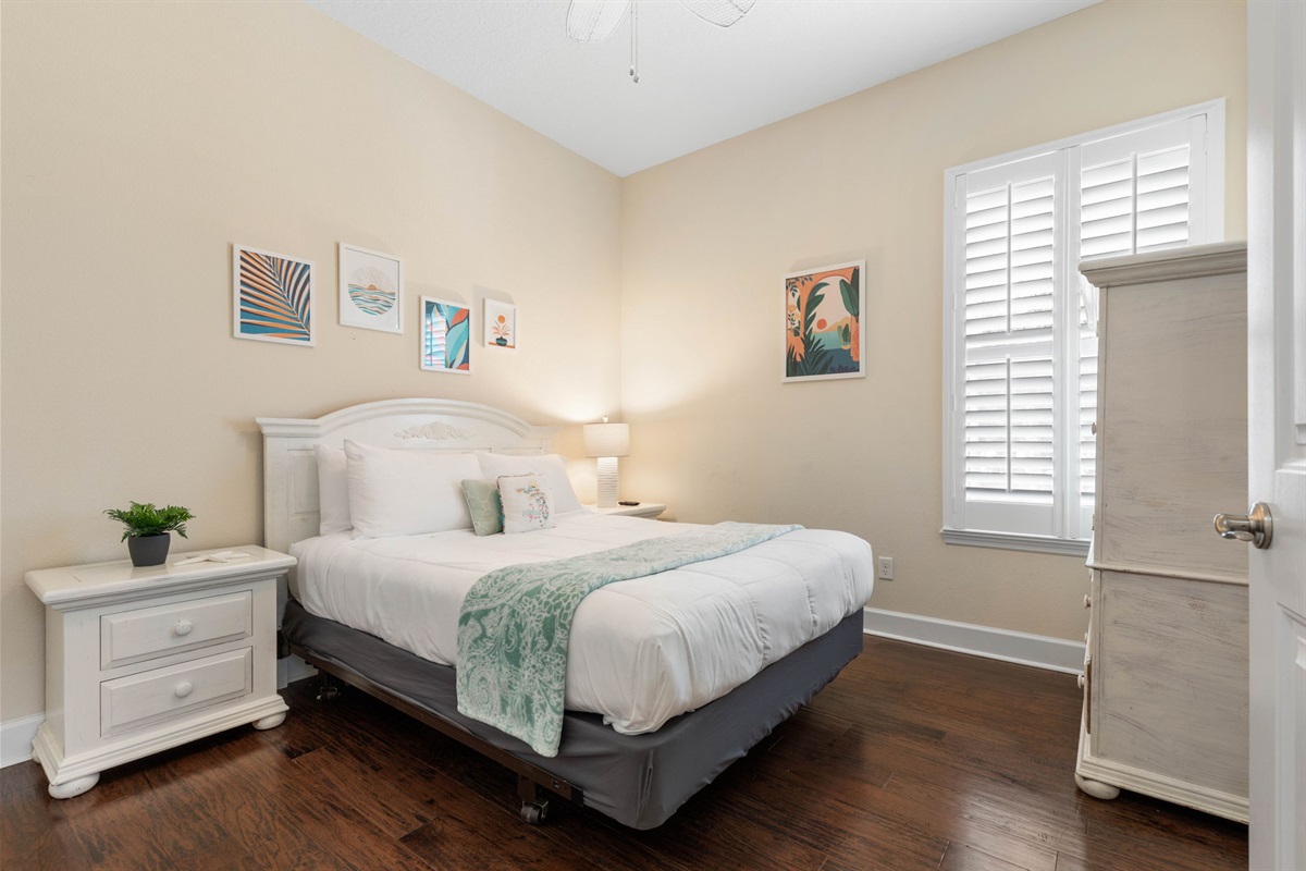 End the day behind a closed door, sink into crisp sheets, and wake refreshed for another beach adventure—this bright, breezy bedroom is your quiet coastal retreat for slow mornings, midday naps, and deeply restful nights.