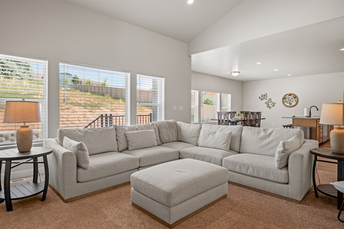 Seamless indoor-outdoor living—step from the cozy living and dining areas directly onto the patio for fresh air, and splendid meals.
