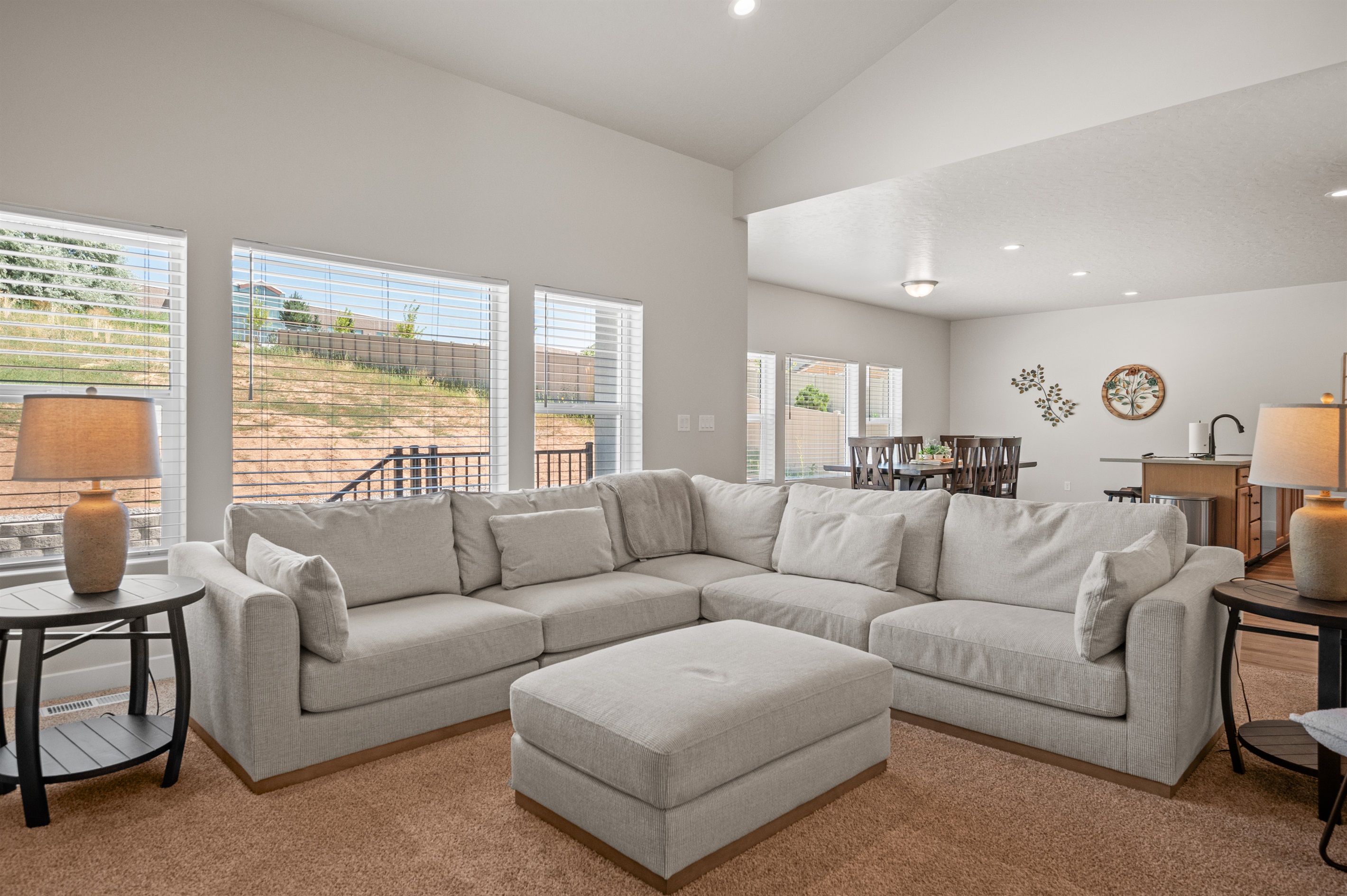 Seamless indoor-outdoor living—step from the cozy living and dining areas directly onto the patio for fresh air, and splendid meals.