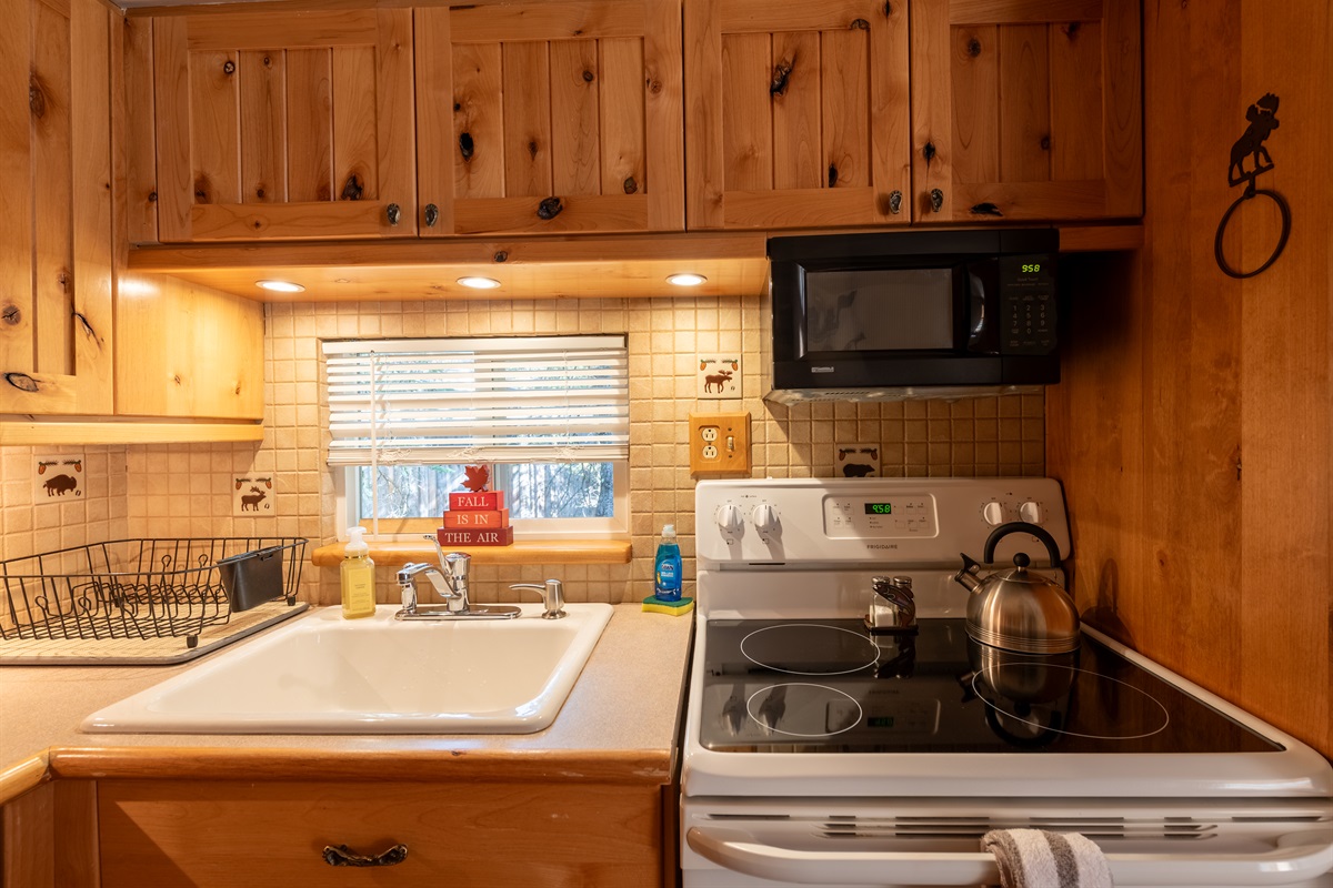 Fully stocked kitchen, including an air fryer, large crockpot, electric griddle, and waffle maker
