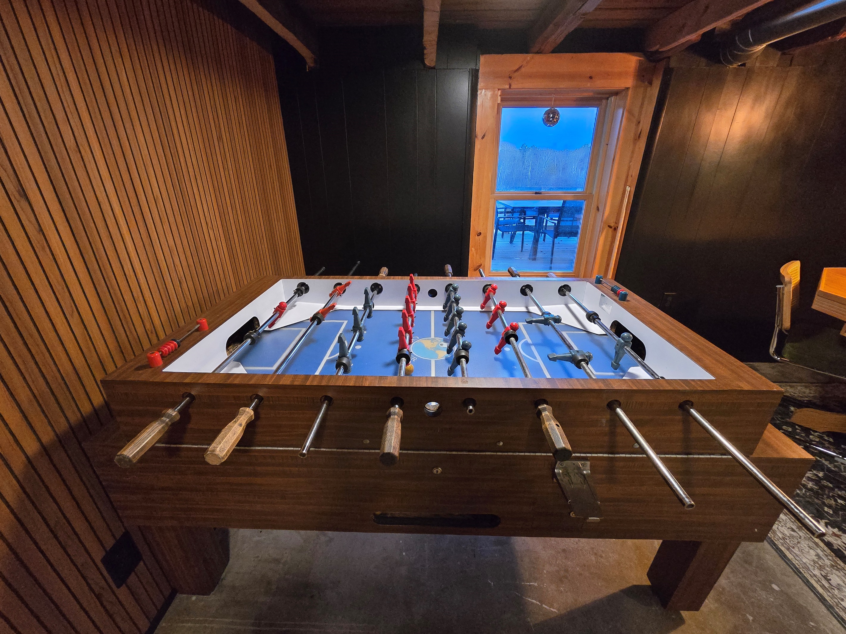 Ready to score?  This foosball table is calling your name! Spin, kick, and laugh in our playful basement hideaway. 