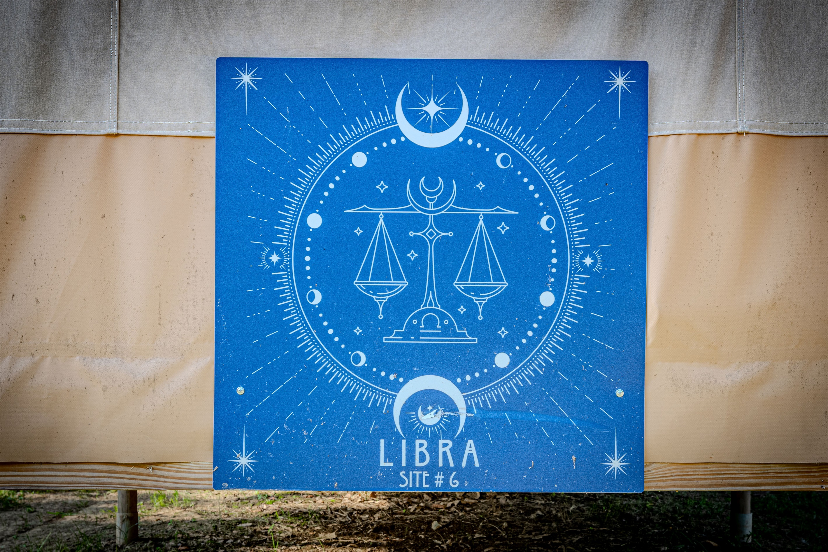 When you see this sign on the back of the tent, you'll know you've arrived.