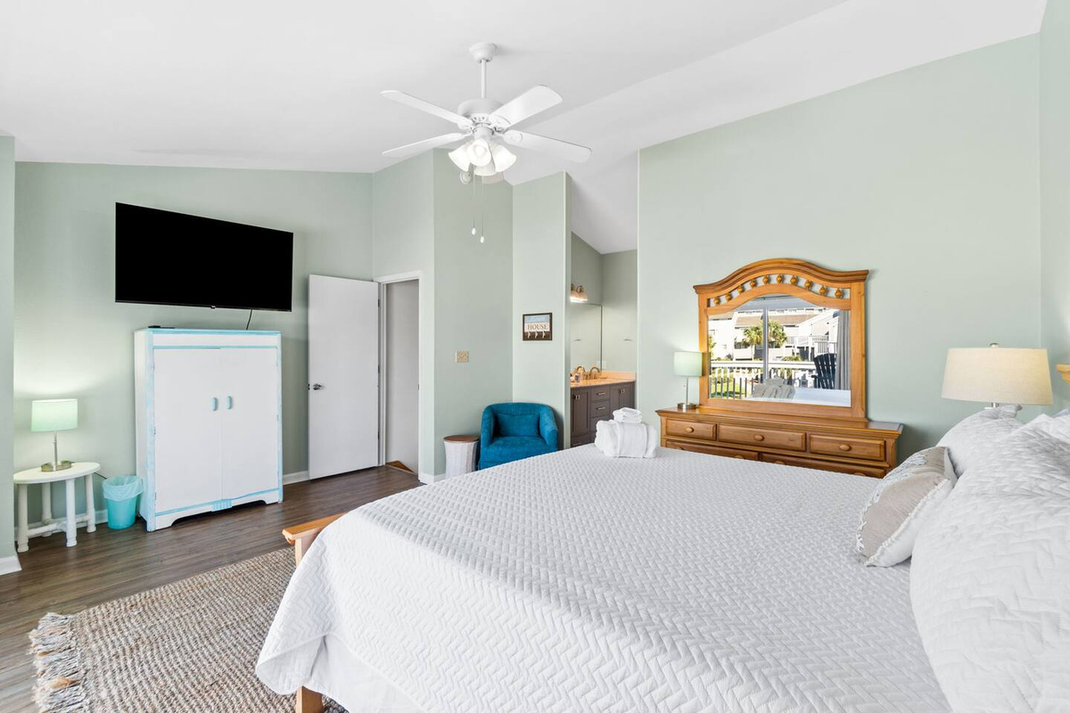 Catch up on your shows from the king bed &mdash; the big smart TV is positioned exactly where you'd want it.