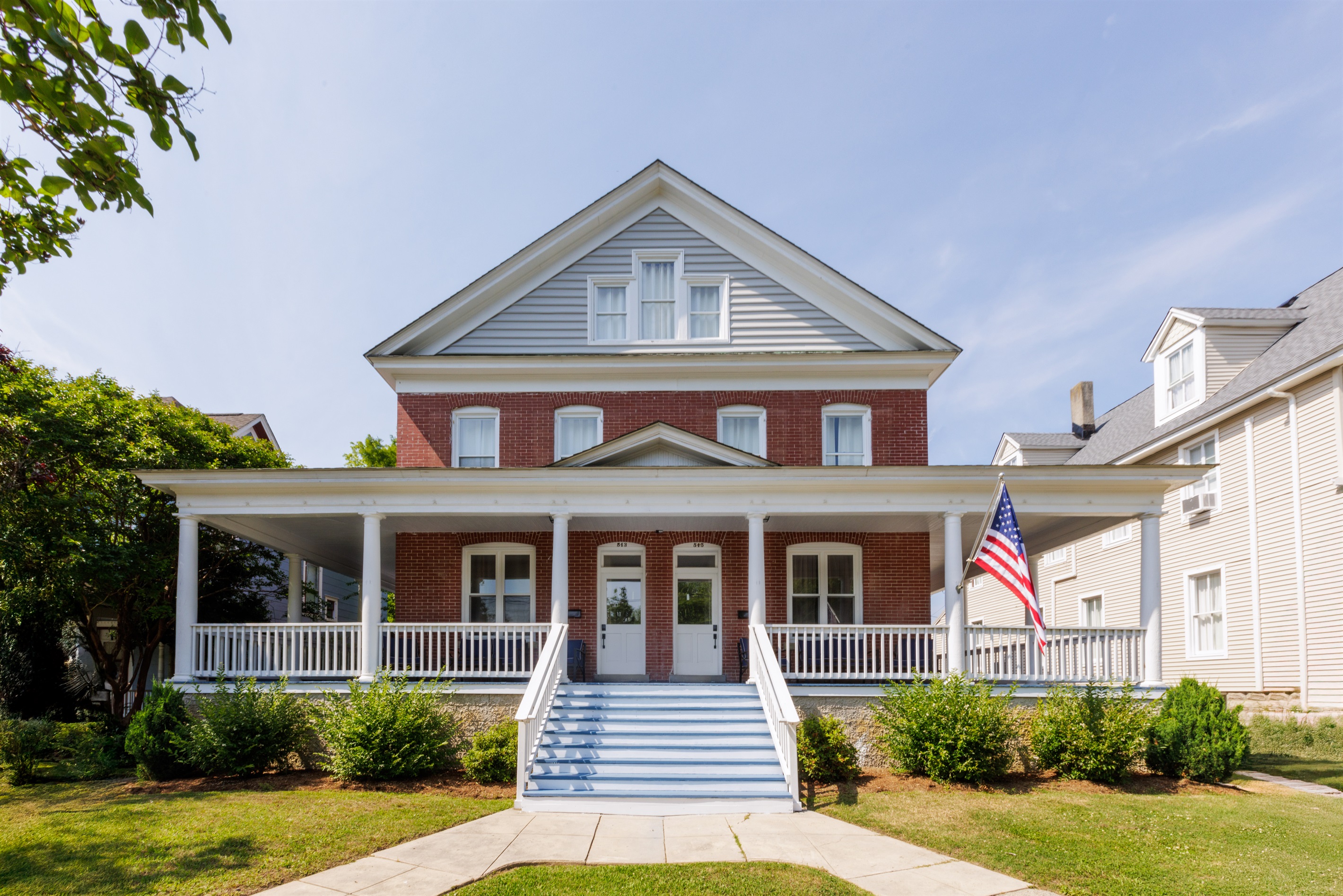 Guests can enjoy the large wrap around porch and its lounge furniture.