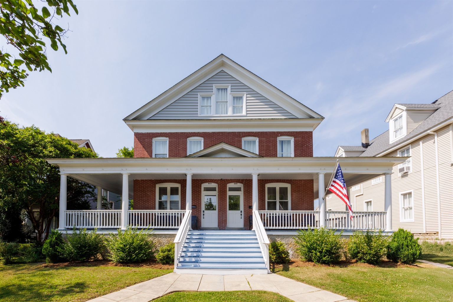 Guests can enjoy the large wrap around porch and its lounge furniture.