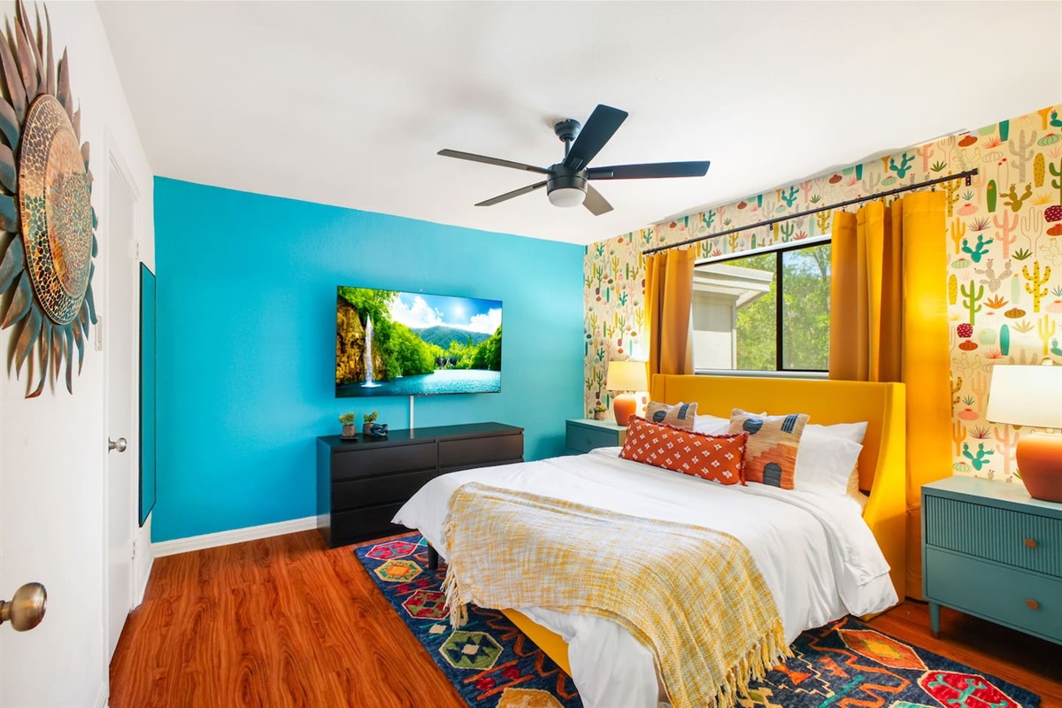  Bright and comfortable with soft linens and cheerful accents.