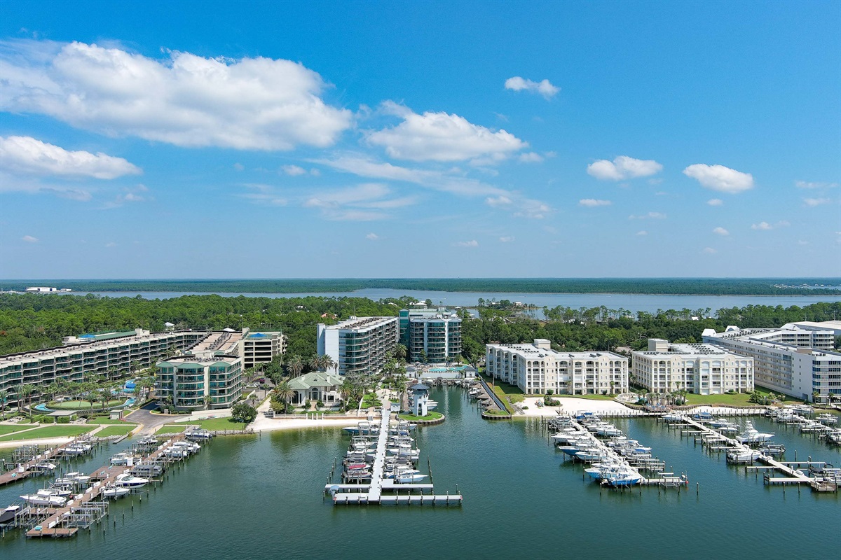 Discover the extraordinary lifestyle at Lighthouse on the Bay II. This vibrant community offers an array of amenities, from private boat slips and bayfront recreation to resort-style pools and elegant living spaces, all set against a stunning waterfront ba