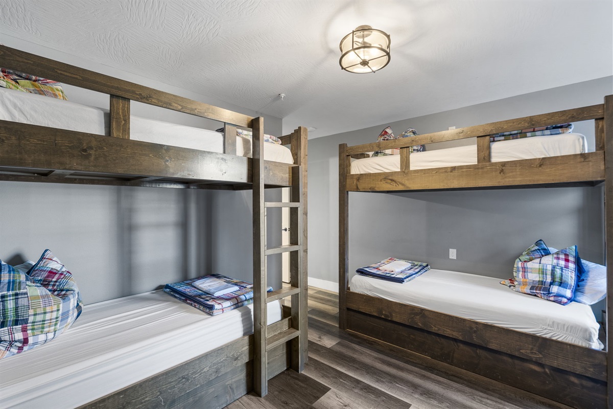 Lower level bunk room with attached bathroom