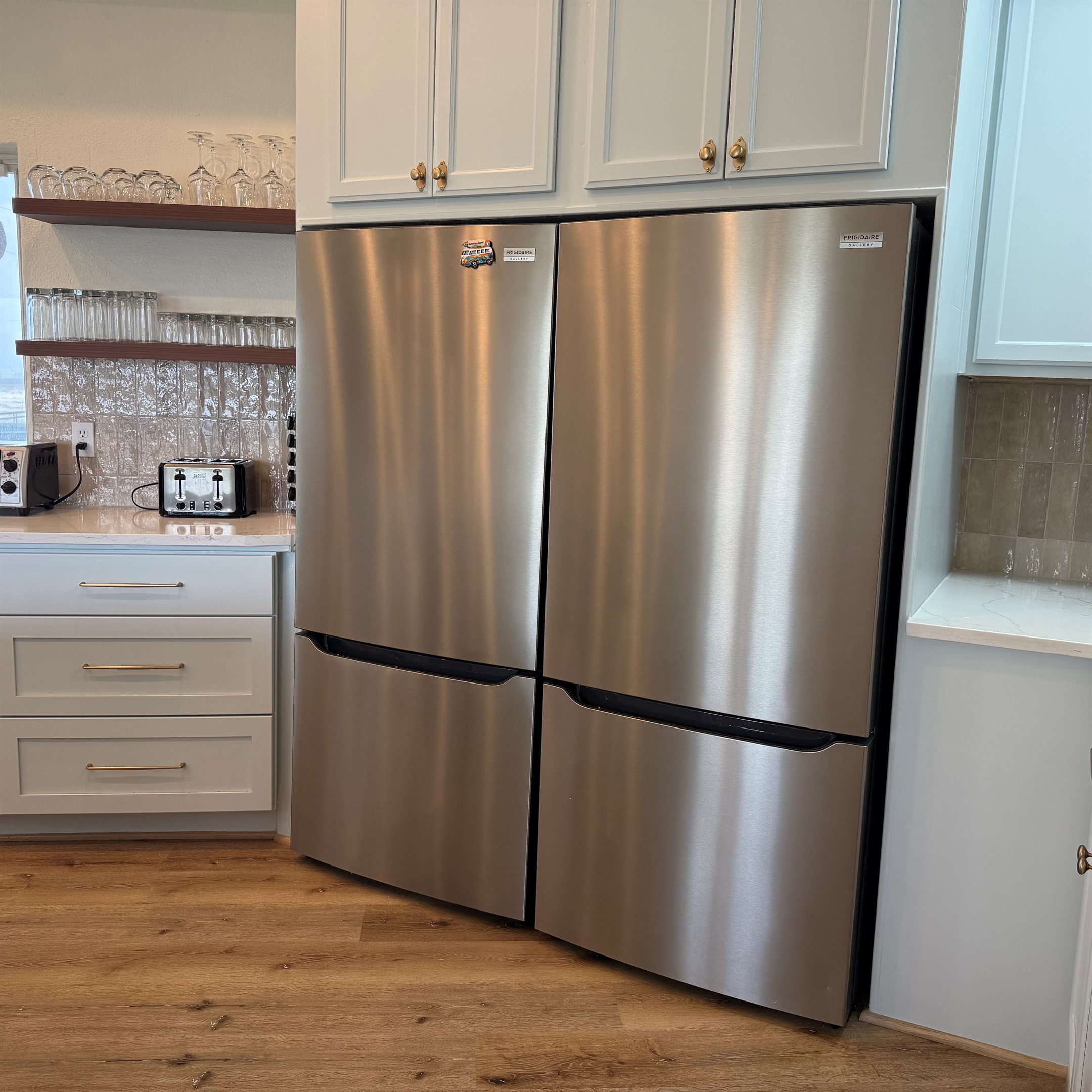 Double Fridges with double ice makers and a built in ice maker too! 