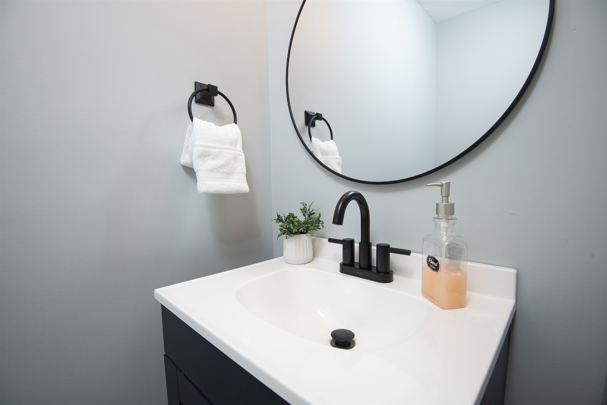 The downstairs half-bath, perfectly tucked away