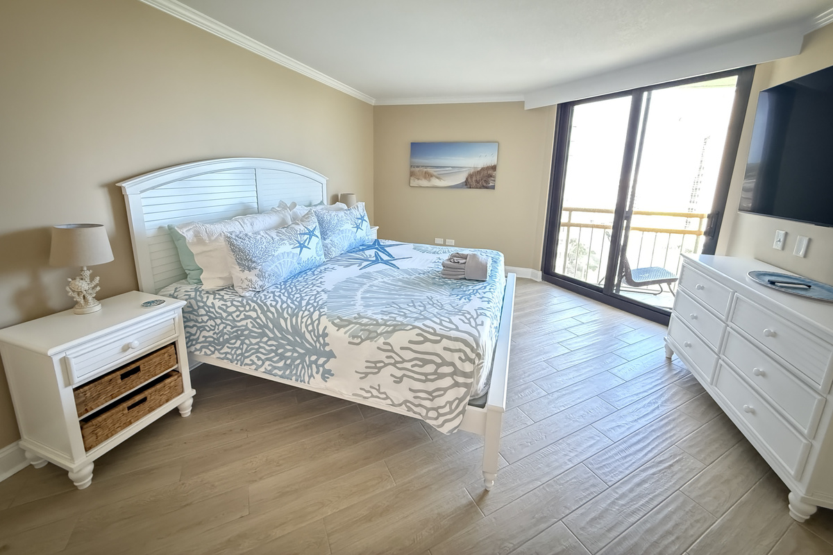 Primary Bedroom w/King Bed and Small, Private Balcony