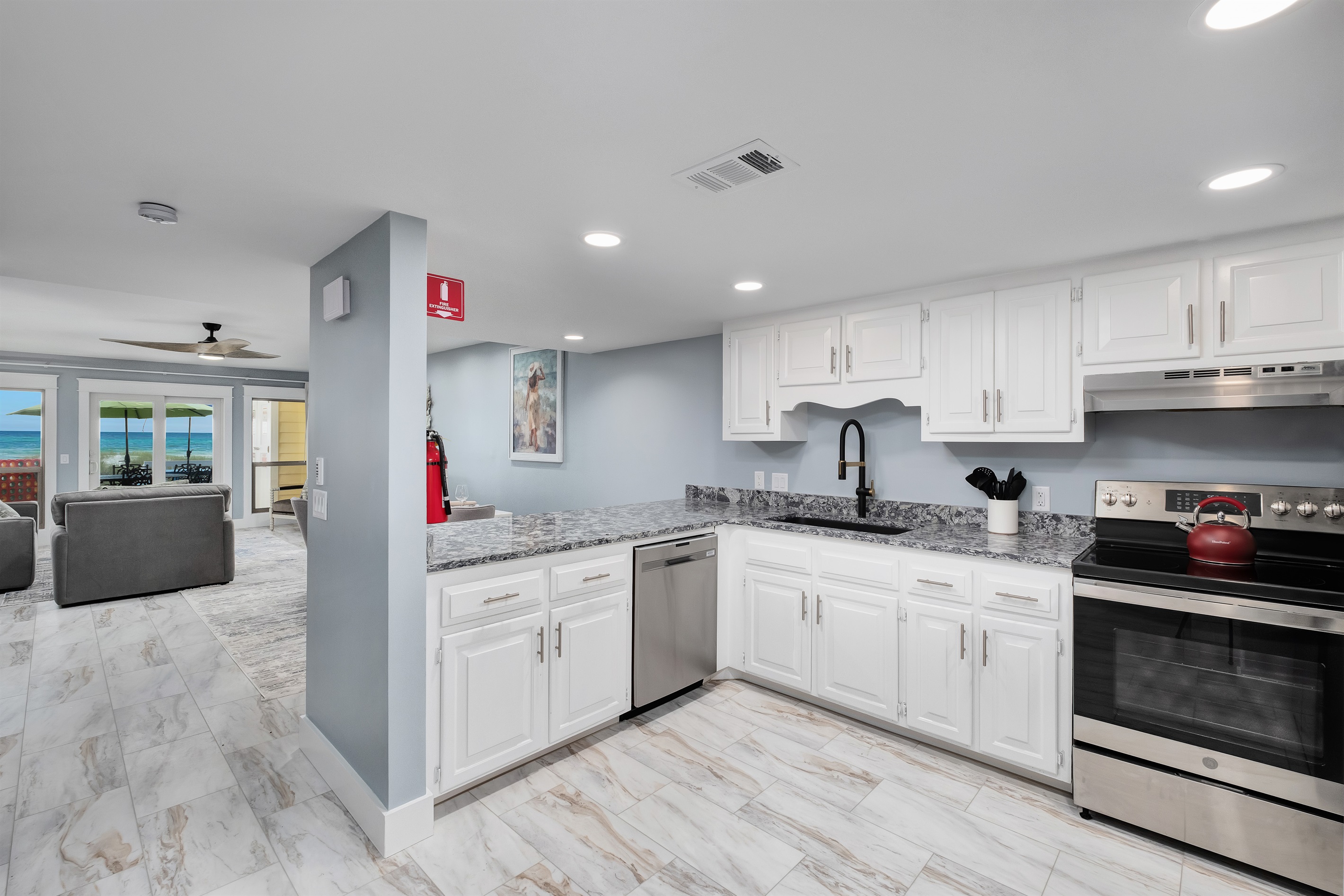 Cook up a storm in our fully-equipped kitchen featuring stainless steel appliances, granite countertops, and ample storage. A great space for preparing meals and enjoying time with loved ones.